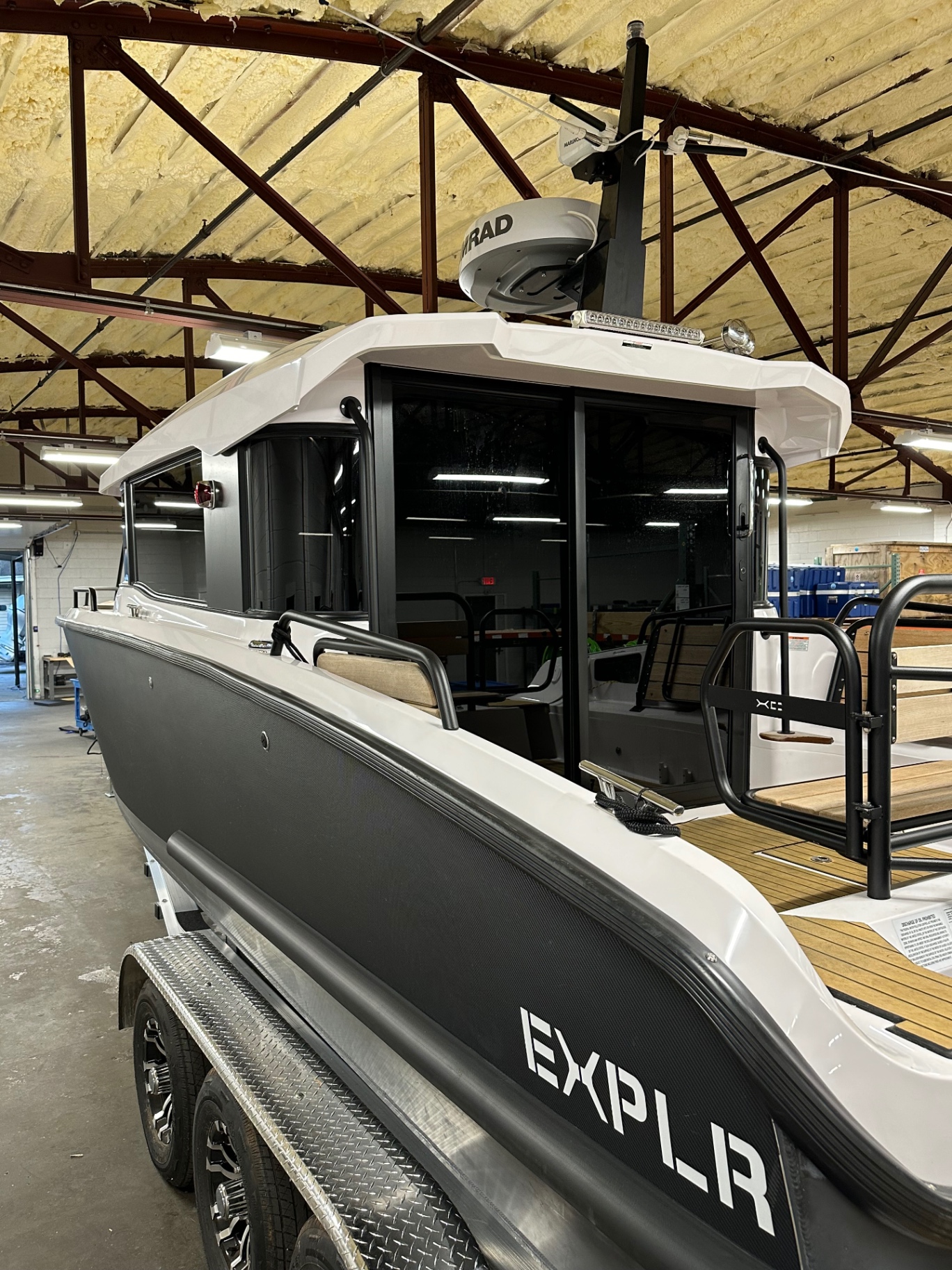 Close view of the boat cabin's tinted sliding glass doors